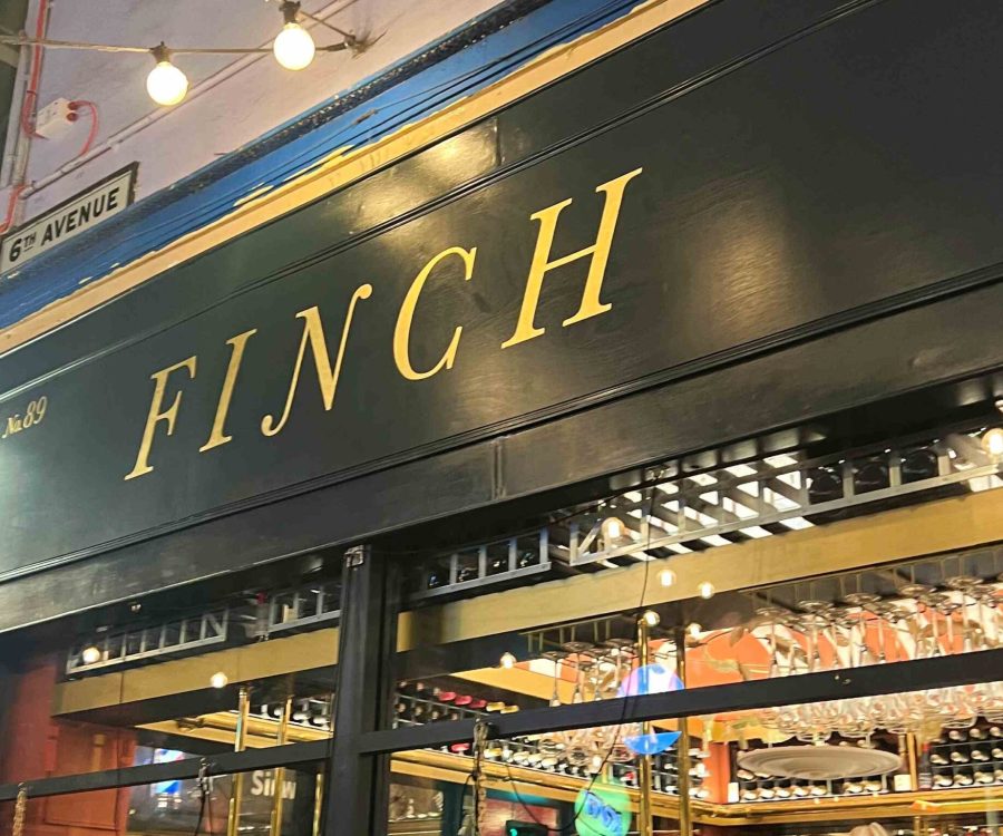 The exterior signage of Finch Wine Bar.